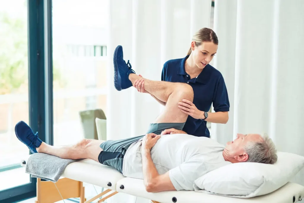 Revitalising Recovery: Effective Rehabilitation Strategies for Muscle Injuries 3 Physiotherapist assisting a patient with muscle recovery exercises Billingshurst
