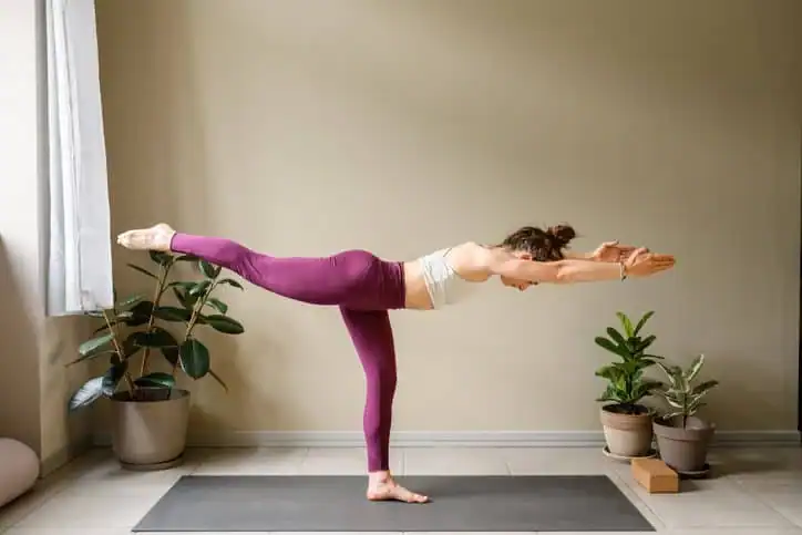 Woman doing Yoga exercise Billingshurst to help with toning the body. 